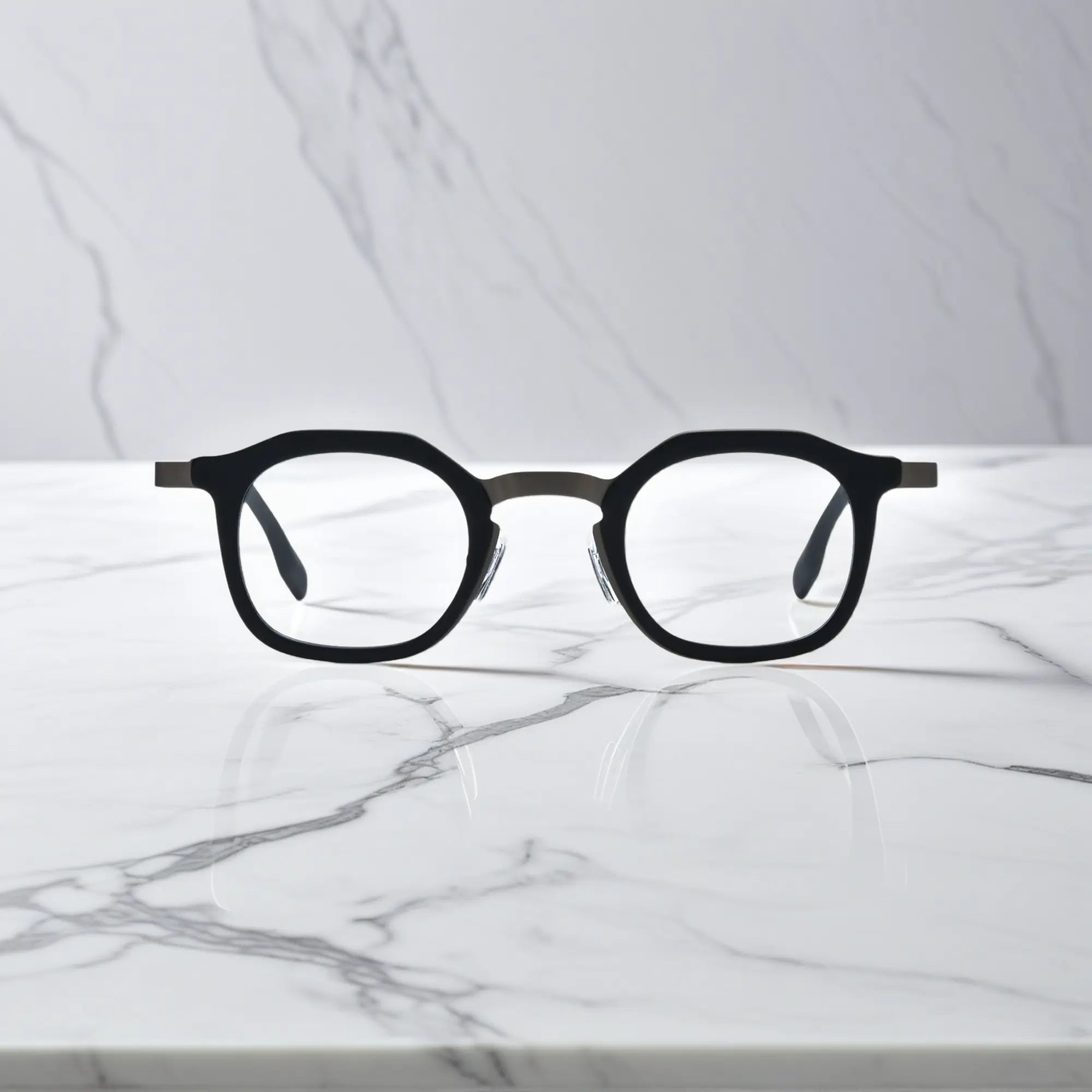 Front view of VoyueLens™ Graphite Mist square eyeglasses with a matte grey acetate front and black titanium temples.